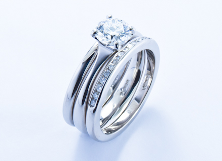 Eternity style platinum eternity ring channel set with round brilliant cut diamonds