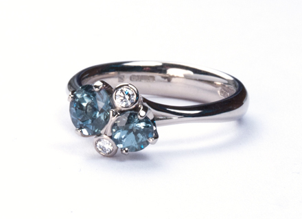 Large teal sapphire spring meadow ring in 18ct Fairtrade gold