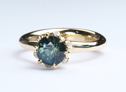 Meadow yellow gold ring with teal sapphire and diamonds