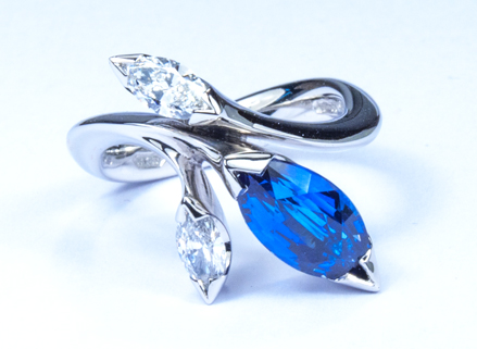 Large Floral platinum ring with marquise cut sapphire and diamonds