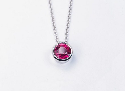 Ruby sculptured sweep pendant 