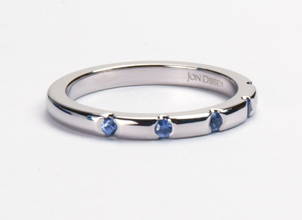 Platinum endset eternity ring set with brilliant cut sky blue sapphires